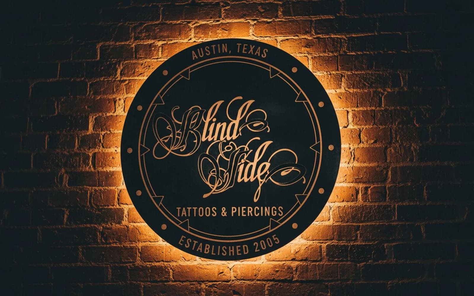 Backlit sign mockup for BlindSide Tattoo & Piercing