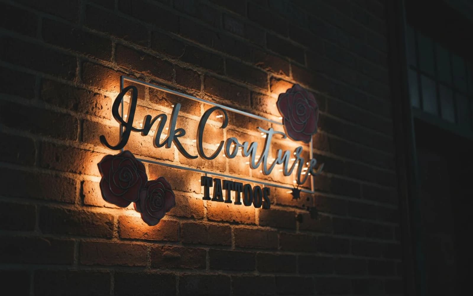 Backlit sign mockup for Ink Couture Tattoos