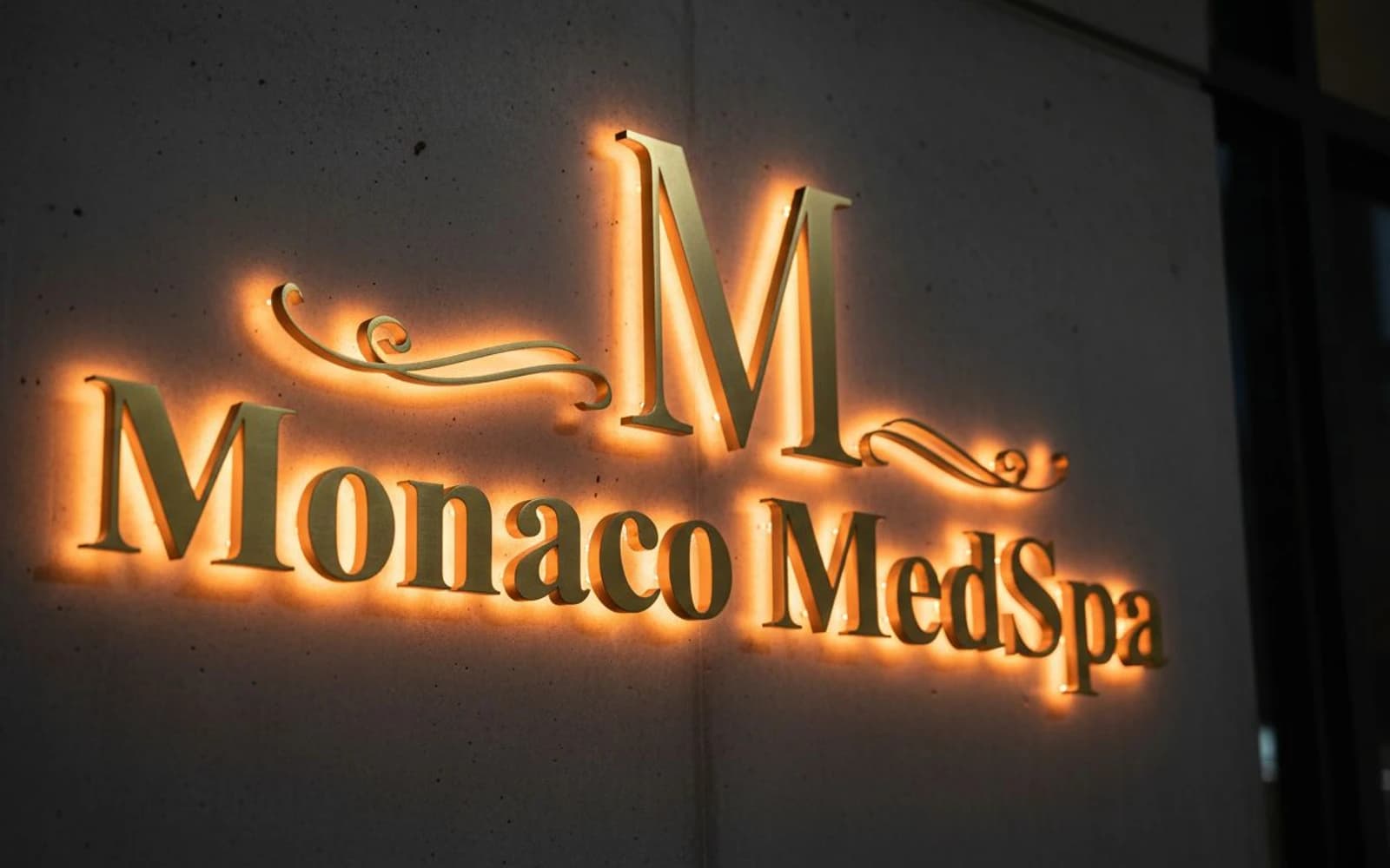 Backlit sign mockup for Monaco MedSpa