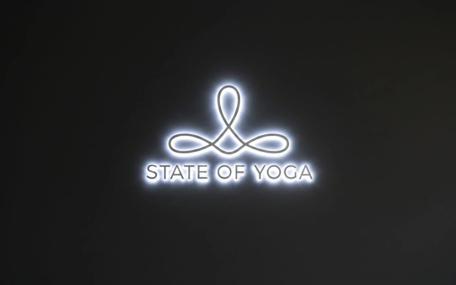 Backlit sign mockup for State of Yoga
