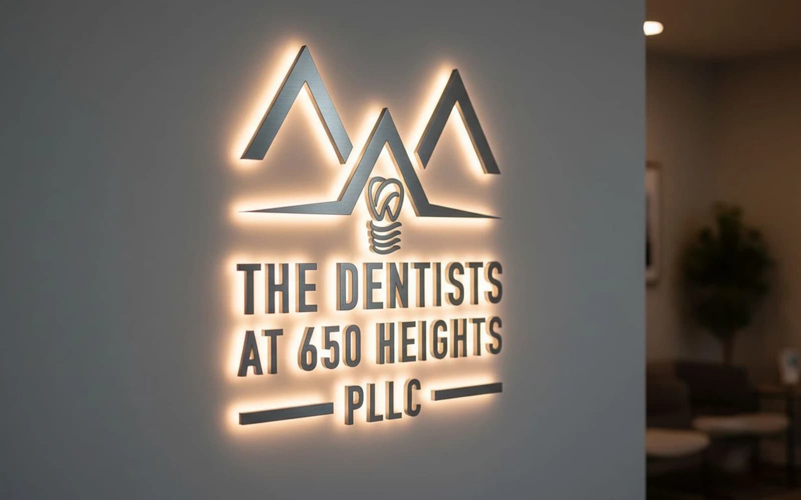 Backlit sign mockup for The Dentists at 650 Heights