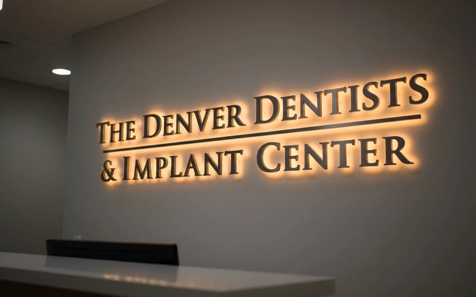 Backlit sign mockup for The Denver Dentists