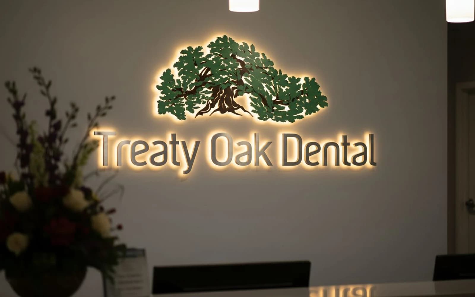 Backlit sign mockup for Treaty Oak Dental